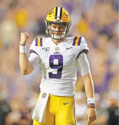  ?? CHUCK COOK/USA TODAY SPORTS ?? Joe Burrow is chasing the NCAA record for completion percentage while leading the Tigers toward the College Football Playoff.