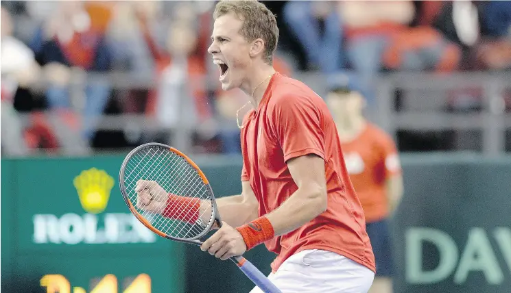  ?? PHOTOS: JUSTIN TANG / THE CANADIAN PRESS ?? Canada’s Vasek Pospisil says he is working on being more aggressive and making the points shorter in his game.