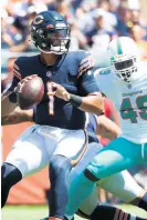  ?? KIM/
CHICAGO TRIBUNE ?? Justin Fields passes against the Miami Dolphins in the second quarter on Saturday. John J.
