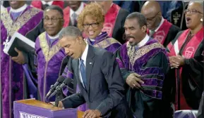  ?? The Associated Press ?? President Barack Obama sings “Amazing Grace” during services honouring the life of Rev. Clementa Pinckney, at the College of Charleston TD Arena in Charleston, S.C.