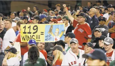  ?? Elise Amendola / Associated Press ?? Fans celebrate at Dodger Stadium after the Red Sox won Game 5 of the World Series on Sunday.