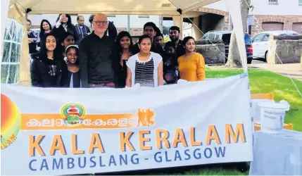  ?? ?? Success Father Morton was joined by members of the Keralese community to sell curries after Sunday’s service