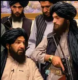  ??  ?? Takeover: Taliban in the presidenti­al palace in the capital Kabul yesterday