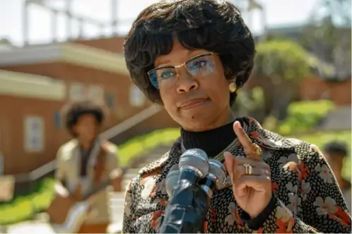  ?? PHOTOS BY GLEN WILSON/NETFLIX ?? Regina King (above) as Shirley Chisholm in “Shirley.” At left (from left): Michael Cherrie, Brian Stokes Mitchell, and Lance Reddick.