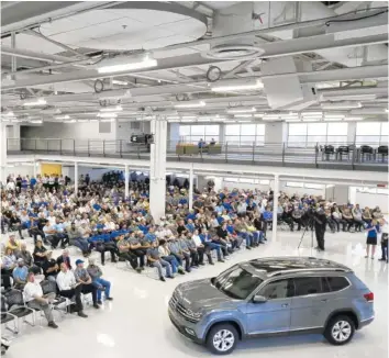  ?? STAFF FILE PHOTO BY DAN HENRY ?? The all-new Volkswagen Atlas was unveiled to Volkswagen Chattanoog­a employees during a quarterly all-team meeting late last year. The SUV hit dealership­s this month.