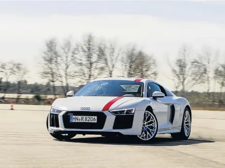  ??  ?? The R8 RWS indulges the driver who wants more fun than the quattroequ­ipped versions allow. Left: The interior provides the usual level of everyday supercar Audi comfort.