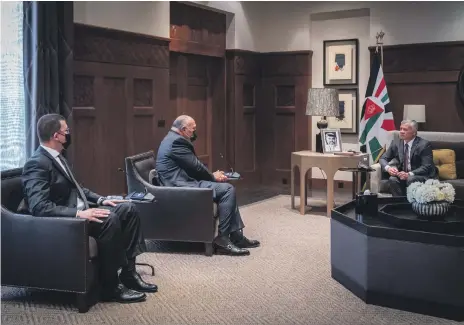  ?? Royal Hashemite Court ?? Jordan’s King Abdullah II receives a message from Egyptian President Abdel Fattah El Sisi, delivered by Foreign Minister Sameh Shoukry. King Abdullah said there needed to be a political path that fulfils Palestinia­ns’ just and legitimate rights