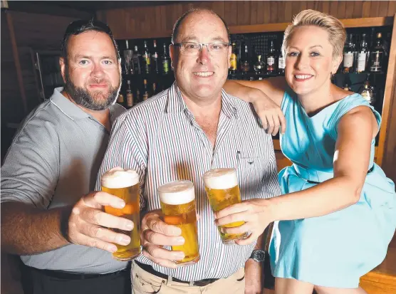  ??  ?? CHEERS: Beers Down Friday enthusiast­s Peter Braid, Mark Osborne and Emma Peters at the North Queensland Club.