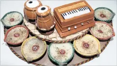  ??  ?? Indian musical instrument themes add interest to clay lamps.