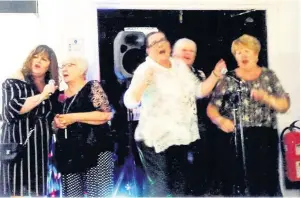  ??  ?? A group of former pupils from Hind Leys College held a reunion to celebrate 50 years since they left the school and raise funds for the air ambulance service. Pictured are former students, friends and family members at the reunion which was held at the...