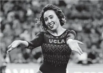  ?? Ben Liebenberg / Associated Press ?? The NCAA has bowed to pressure from state legislatur­es and will let athletes such as UCLA gymnast Katelyn Ohashi, whose floor routines have gone viral, profit from their names.