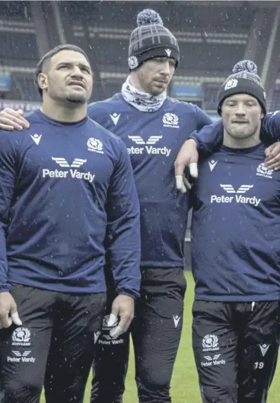  ?? ?? Scotland co-captains Rory Darge and Finn Russell lead the team huddle during yesterday’s training run at Murrayfiel­d. Above, France defence coach Shaun Edwards cut an angry figure during his pre-match press conference