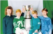  ?? RYAN FAMILY ?? Erica, Jon, Steve and Jill Ryan (left to right) with the
Grey Cup in 1989.