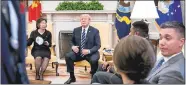  ?? AP PHOTO/ANDREW HARNIK ?? President Donald Trump watches as members of the media are escorted out of a meeting with American workers in the Oval Office at the White House last month in Washington.