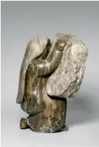  ??  ?? Oviloo Tunnillie (1949-2014 Kinngait) SelfPortra­it with Carving Stone 1998 Serpentini­te 53 x 37.5 x 33.3 cm Courtesy Winnipeg
Art Gallery Photo Ernest Mayer