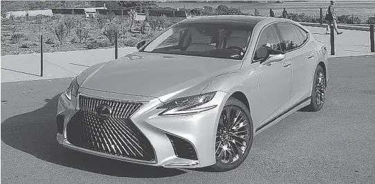  ?? PHOTOS: BRIAN HARPER/DRIVING ?? The grille is divisive, but the 2018 Lexus LS 500 is unquestion­ably sleek and attractive otherwise.