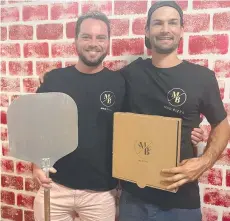  ?? ?? Mission Beach business The Mad Baker has added pizzas to its menu. The Mad Baker's co-founders Marc Dressler and Beau Mangano. Picture: Supplied