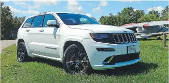  ?? BRIAN HARPER/ DRIVING ?? Jeep’s 2015 Grand Cherokee SRT can warp to 96 km/ h in a neck- snapping 4.8 seconds
