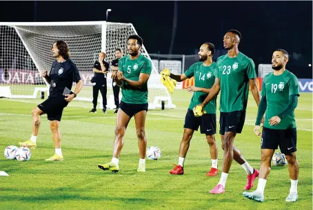  ?? Reuters ?? Saudi Arabia’s Ali Al Bulayhi, Abdullah Otayf, Mohamed Kanno and Hatan Bahbri during training at the Sealine Training Site, Mesaieed, Qatar, on Tuesday.