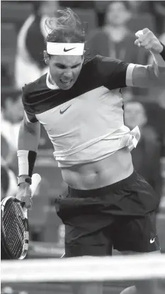  ?? FRANCE PRESSE
AGENCE ?? Rafael Nadal of Spain celebrates winning his men's singles second round match against Ivo Karlovic of Croatia at the Shanghai Masters tennis tournament in Shanghai.