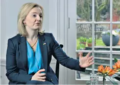  ?? ?? Liz Truss delivers an uncompromi­sing message on Russia during a visit to Washington