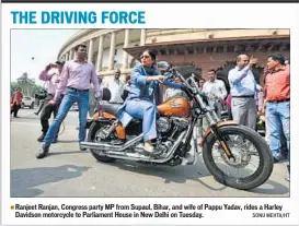  ?? SONU MEHTA/HT ?? Ranjeet Ranjan, Congress party MP from Supaul, Bihar, and wife of Pappu Yadav, rides a Harley Davidson motorcycle to Parliament House in New Delhi on Tuesday.