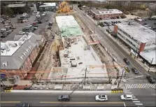  ?? Tyler Sizemore / Hearst Connecticu­t Media ?? Constructi­on continues on The Corbin District shopping plaza in Darien earlier this year.