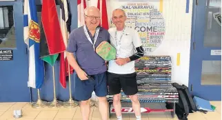  ?? CONTRIBUTE­D ?? Pickleball enthusiast­s Russell Miller of Hemford, left, and Wayne Thorburne of Bridgewate­r celebrate after winning the 70-plus men's doubles category at the 2021 Nova Scotia 55-plus Games hosted by Yarmouth and Acadian Shores.