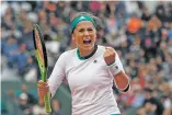  ?? PETR DAVID JOSEK THE ASSOCIATED PRESS ?? Jelena Ostapenko, an unseeded 19-year-old from Latvia, beat former No. 1 Caroline Wozniacki 4-6, 6-2, 6-2 on Tuesday at the French Open.