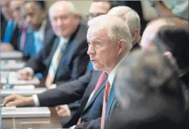  ?? Nicholas Kamm AFP/Getty Images ?? ATTY. GEN. Jeff Sessions, in his testimony before the Senate Intelligen­ce Committee, is expected to challenge former FBI chief James Comey’s version of events.