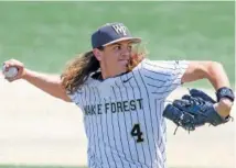  ?? AP FILE PHOTO/BEN MCKEOWN ?? Wake Forest pitcher Rhett Lowder’s 13 wins are the most in the nation this season, and he gives the top-seeded Demon Deacons reason to be confident heading into the NCAA tournament and their Winston-Salem Regional that starts Friday.*