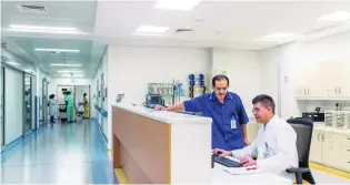  ?? Alex Atack for The National ?? Left, Ahmad Sabbah, a nurse manager, and Jose Salmon, a critical care specialist, at Rashid Hospital in Dubai. The study found that diversity is a positive in the workplace.