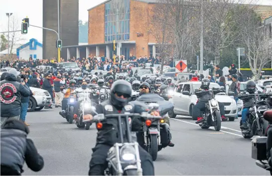  ?? Photos / Alex Burton ?? More than 300 people turned up at the funeral of Head Hunters gang member Taranaki “Ardie” Fuimaono, who died shortly after being taken into police custody.