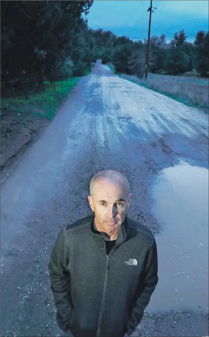  ?? Mark Boster For The Times ?? AUTHOR Don Winslow, whose trilogy’s finale, “The Border,” lands Tuesday, on a San Diego County road with a rough history.