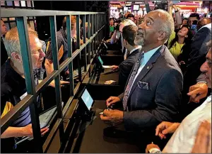  ?? AP/DAVID KLEPPER ?? State Assemblyma­n Gary Pretlow places a sports bet last week at Rivers Casino and Resort in Schenectad­y, N.Y.