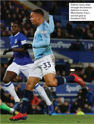  ??  ?? Gabriel Jesus skips through the Everton defence to score Manchester City’s second goal at Goodison Park