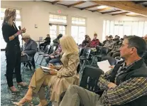  ?? JUSTIN HORWATH/THE NEW MEXICAN ?? Colleen Gavin, a partner in the Santa Fe developmen­t management firm of JenkinsGav­in, told neighbors at a meeting Wednesday that Glorieta Camps is working to obtain retroactiv­e approval of constructi­on and other developmen­t on the property.