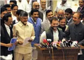  ?? — PRITAM BANDYOPADH­YAY ?? DMK president M. K. Stalin ( from left), Andhra CM N. Chandrabab­u Naidu, Congress president Rahul Gandhi, LJD leader Sharad Yadav, Congress leader Ghulam Nabi Azad and others address the media in New Delhi on Monday after a meeting of Opposition parties.