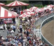  ?? PHOTO COURTESY NYRA ?? The turn at Saratoga Race Course will again be filled, but a week earlier as NYRA announced a July 11start date earlier this week. It could offer more entries for betters and horseman and another weekend for racing fans.