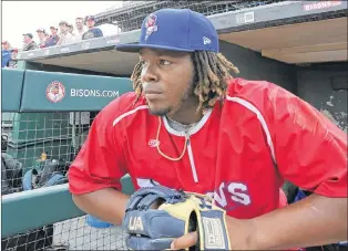  ?? AP PHOTO ?? Buffalo Bisons third baseman Vladimir Guerrero Jr. looks on before a minor league game against the Lehigh Valley Ironpigs in Buffalo, N.Y., Tuesday.