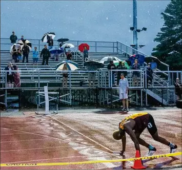  ?? James Franco / Special to the Times Union ?? A steady rain falls June 8 during the Group 1, Section II championsh­ips at Shenendeho­wa High School in Clifton Park.