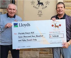  ?? ?? ●●Rossendale Golf Club President Brian Pickering (left) and Profession­al Steven Nicholls.with the charity cheque