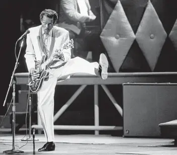  ?? JAMES A. FINLEY/THE ASSOCIATED PRESS FILES ?? In this Oct. 17, 1986 file photo, Chuck Berry performs during a concert celebratio­n for his 60th birthday at the Fox Theatre in St. Louis, Mo. Berry died March 18, at the age of 90. His last album, Chuck, will be released on Friday.