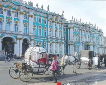 ?? JEREMY HAINSWORTH ?? The Winter Palace of the czars in St. Petersburg — with its high ceilings and lavishly gilded archways — contains the Hermitage Museum which houses one of the world’s finest art collection­s.