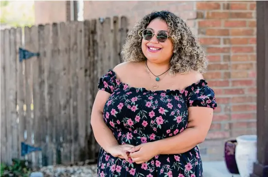  ?? Photos by Salgu Wissmath/Staff photograph­er ?? Azhalia Ramirez encourages others to keep care kits in their cars, providing the homeless with supplies as simple as a granola bar and a bottle of water.