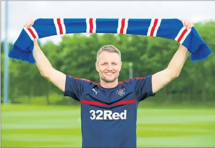  ??  ?? HOLDING UP: Former Queens Park Rangers defender Clint Hill, 37, is following the lead of assistant manager Davie Weir