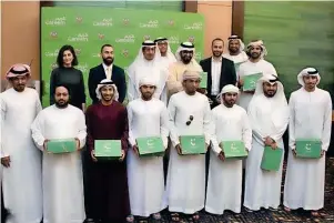  ?? Supplied photos ?? The first group of Emirati Captains with the management of Careem. —