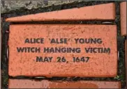  ?? (AP/Jessica Hill) ?? A brick memorializ­ing Alice “Alse” Young is seen Jan. 24 in a town Heritage Bricks installati­on in Windsor. Young was the first person on record to be executed in the 13 colonies for witchcraft.