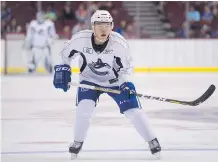  ?? GERRY KAHRMANN ?? Chinese-born defenceman Simon Chen participat­es in the Canucks’ Summer Showdown prospects game last week in Vancouver. The 20-yearold BCHL player has NCAA aspiration­s.
