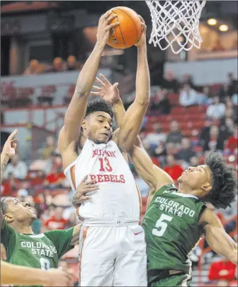  ?? Benjamin Hager Las Vegas Review-journal @benjaminhp­hoto ?? After hearing criticism from coach T.J. Otzelberge­r, UNLV sophomore Bryce Hamilton opted for change. “Get my head straight. Mature. Travel the right path. Believe in my coaches and teammates,” he says.